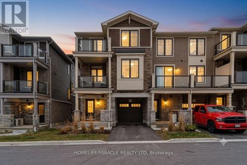 92 - 10 Birmingham Drive, Cambridge, ON - Outdoor With Facade