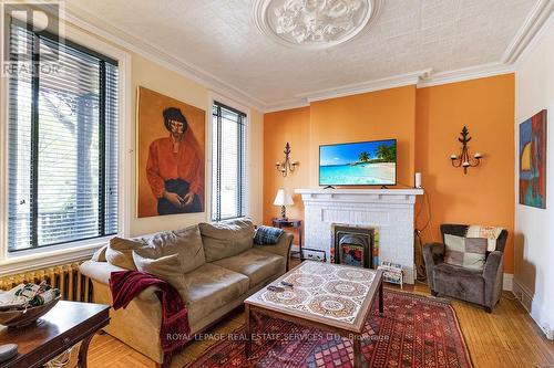 100 Wentworth Street S, Hamilton, ON - Indoor Photo Showing Living Room With Fireplace