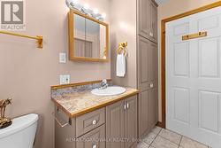 Conveniently located powder room. - 