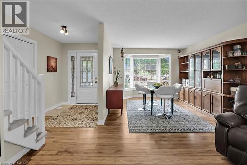 Entrance foyer with stairway and light wood-style floors - 4432 Dennis Avenue, Beamsville, ON - Indoor