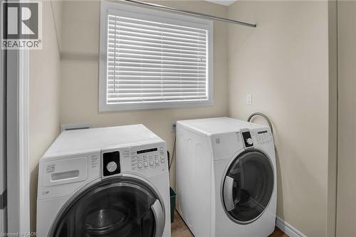 Laundry area with washer and dryer and closet - 4432 Dennis Avenue, Beamsville, ON - Indoor Photo Showing Laundry Room