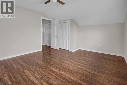 Bedroom featuring ceiling fan, vaulted ceiling, and dark wood finished floors - 4432 Dennis Avenue, Beamsville, ON - Indoor Photo Showing Other Room