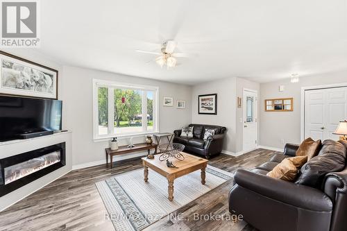 5492 Hwy 620, Wollaston, ON - Indoor Photo Showing Living Room With Fireplace