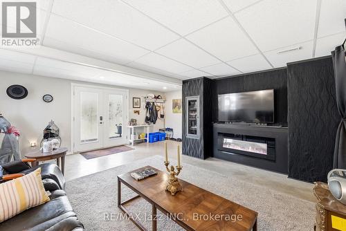 5492 Hwy 620, Wollaston, ON - Indoor Photo Showing Living Room With Fireplace