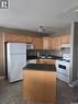 4144 Buckingham Drive E, Regina, SK  - Indoor Photo Showing Kitchen With Double Sink 