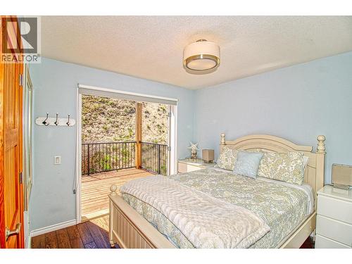 Main floor bed 1 - 7001 Barcelona Drive Unit# 33, Kelowna, BC - Indoor Photo Showing Bedroom