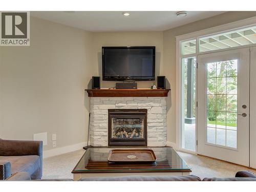 210 Dormie Place, Vernon, BC - Indoor Photo Showing Living Room With Fireplace