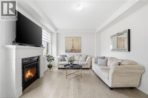 7 Grierson Trail, Waterdown, ON - Indoor Photo Showing Living Room With Fireplace