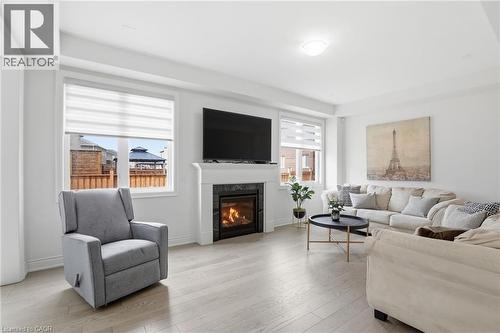 7 Grierson Trail, Waterdown, ON - Indoor Photo Showing Living Room With Fireplace