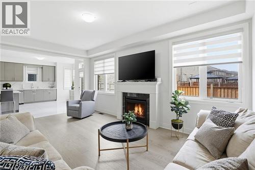 7 Grierson Trail, Waterdown, ON - Indoor Photo Showing Living Room With Fireplace