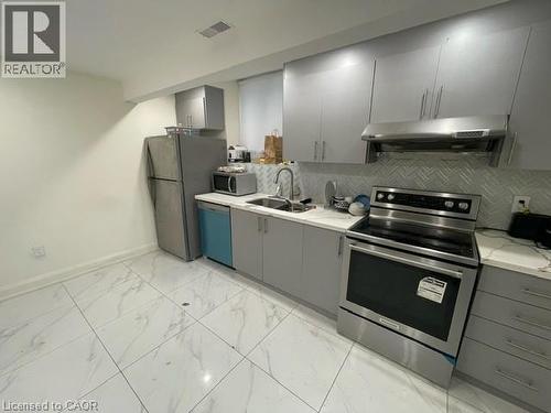 7 Grierson Trail, Waterdown, ON - Indoor Photo Showing Kitchen With Double Sink