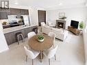 11 Spruceside Drive, Kawartha Lakes, ON  - Indoor With Fireplace 