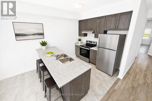 11 Spruceside Drive, Kawartha Lakes, ON - Indoor Photo Showing Kitchen With Double Sink