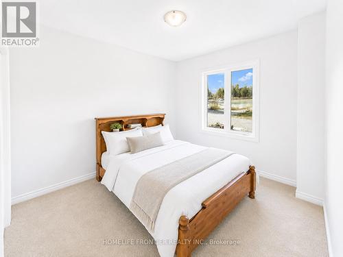 11 Spruceside Drive, Kawartha Lakes, ON - Indoor Photo Showing Bedroom