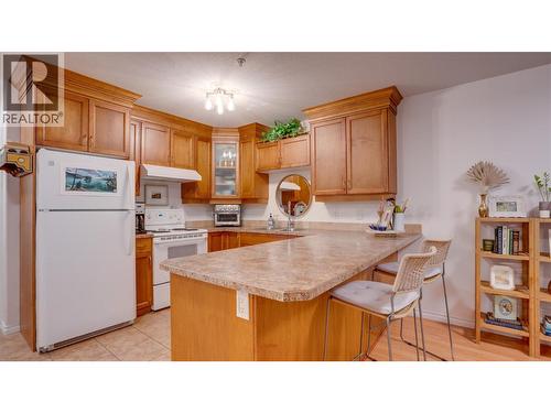 1965 Pandosy Street Unit# 105, Kelowna, BC - Indoor Photo Showing Kitchen With Double Sink
