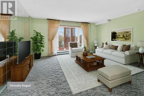 1 - 34 Bow Valley Drive, Hamilton, ON - Indoor Photo Showing Living Room