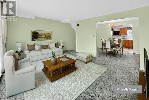 1 - 34 Bow Valley Drive, Hamilton, ON - Indoor Photo Showing Living Room