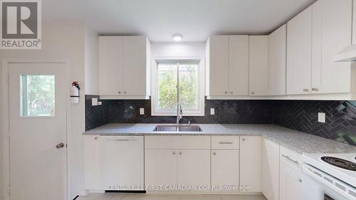 43 Walmer Gardens, London North (North K), ON - Indoor Photo Showing Kitchen With Double Sink