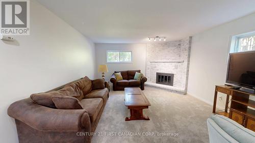 43 Walmer Gardens, London North (North K), ON - Indoor Photo Showing Living Room With Fireplace