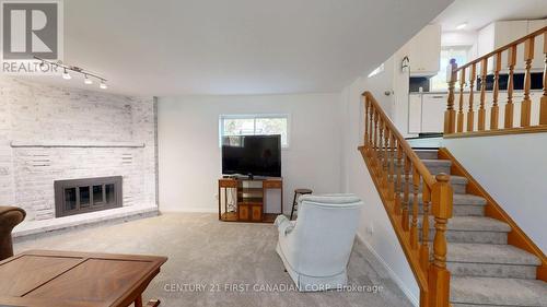 43 Walmer Gardens, London North (North K), ON - Indoor Photo Showing Living Room With Fireplace