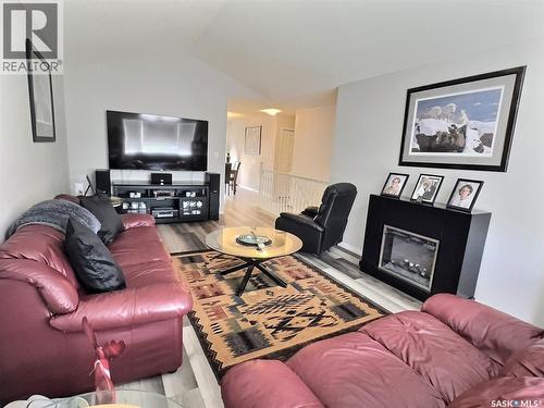 419 Clasky Drive, Estevan, SK - Indoor Photo Showing Living Room With Fireplace
