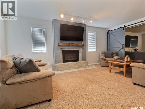 419 Clasky Drive, Estevan, SK - Indoor Photo Showing Living Room With Fireplace