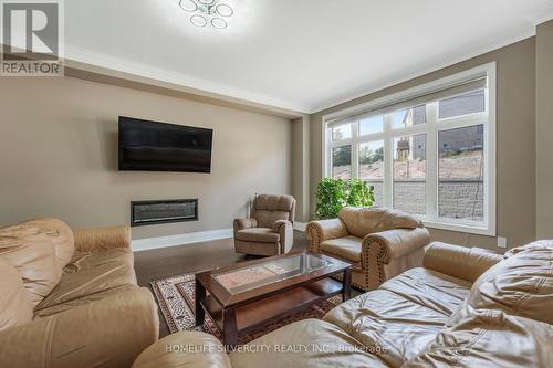 85 James Walker Avenue, Caledon, ON - Indoor Photo Showing Living Room With Fireplace
