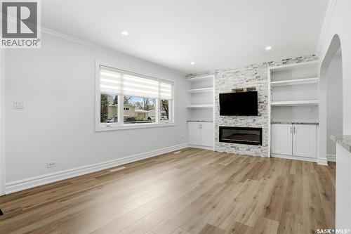 124 Riddell Crescent, Regina, SK - Indoor Photo Showing Living Room With Fireplace