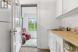 Unit 5 (second floor) sun room by the kitchen - 