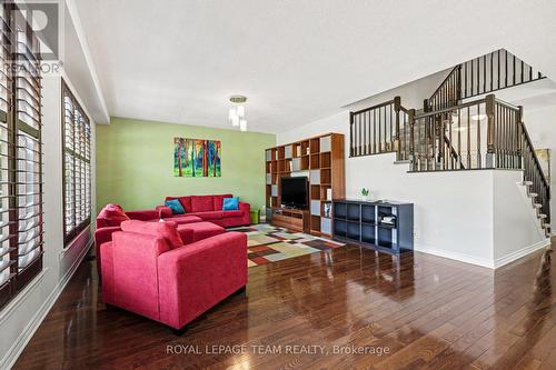 Dinette towards living room and open stair - 65 Osprey Crescent, Ottawa, ON 