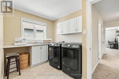 Hand upstairs laundry area - 65 Osprey Crescent, Ottawa, ON 