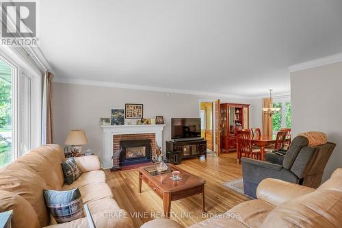2201 Braeside Avenue, Ottawa, ON - Indoor Photo Showing Living Room With Fireplace