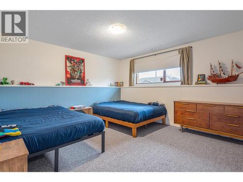 Main Home - Third Bedroom (Basement) - 302 Bass Avenue, Enderby, BC - Indoor Photo Showing Bedroom