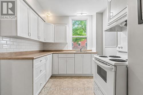 Virtually Staged - 26 Victoria Avenue, Grey Highlands, ON - Indoor Photo Showing Kitchen