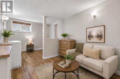 Virtually Staged - 26 Victoria Avenue, Grey Highlands, ON - Indoor Photo Showing Living Room