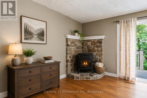 Virtually Staged - 26 Victoria Avenue, Grey Highlands, ON - Indoor Photo Showing Other Room With Fireplace