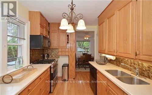 311 Chaplin Crescent, Toronto, ON - Indoor Photo Showing Kitchen With Double Sink