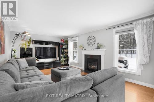 1322 Du Gouverneur Drive, Ottawa, ON - Indoor Photo Showing Living Room With Fireplace