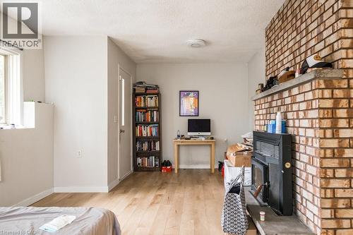 95-97 S Fairholt Road S, Hamilton, ON - Indoor Photo Showing Other Room With Fireplace