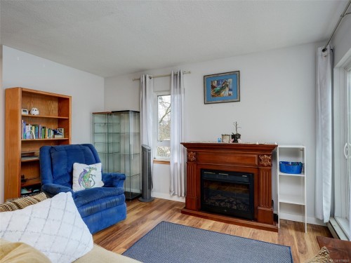 #406-3258 Alder St, Saanich, BC - Indoor Photo Showing Living Room With Fireplace