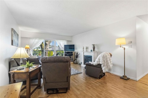 #203-1665 Oak Bay Ave, Victoria, BC - Indoor Photo Showing Living Room With Fireplace