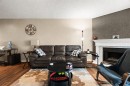 #211-290 Regina Ave, Saanich, BC  - Indoor Photo Showing Living Room With Fireplace 