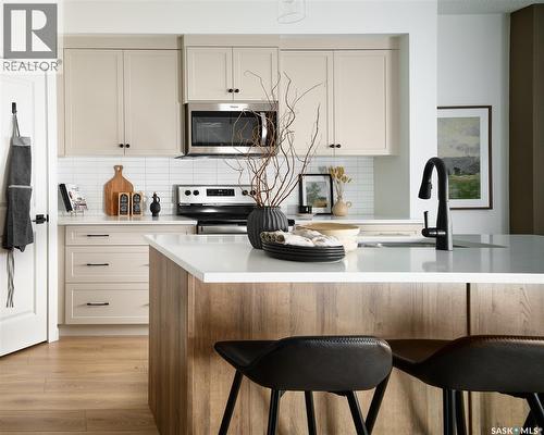 2005 Royal Park Boulevard, White City, SK - Indoor Photo Showing Kitchen With Upgraded Kitchen