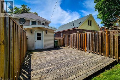 Spacious outdoor deck with privacy fencing - 319 King Street W, Dundas, ON - Outdoor With Exterior