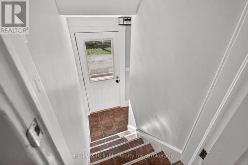 Stairs and side door to basement - 185 Trafalgar Street, West Perth (Mitchell), ON - Indoor Photo Showing Other Room