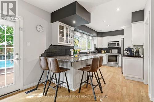 Updated kitchen w/ SS appliances & breakfast bar - 149 Cove Crescent, Hamilton, ON - Indoor