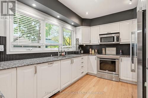 Updated kitchen w/ SS appliances & breakfast bar - 149 Cove Crescent, Hamilton, ON - Indoor Photo Showing Kitchen With Stainless Steel Kitchen