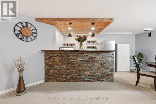 Basement rec room w/ wet bar & stone accent wall - 149 Cove Crescent, Hamilton, ON - Indoor Photo Showing Other Room