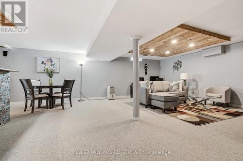 Basement rec room w/ wet bar & stone accent wall - 149 Cove Crescent, Hamilton, ON - Indoor