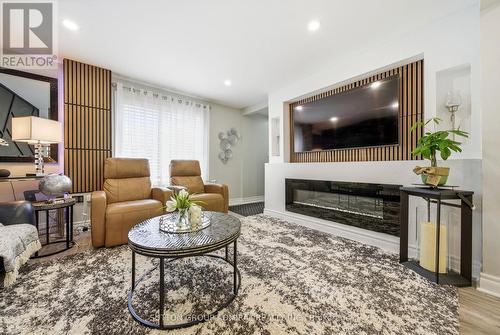 20 Brock Street E, Oshawa, ON - Indoor Photo Showing Living Room With Fireplace
